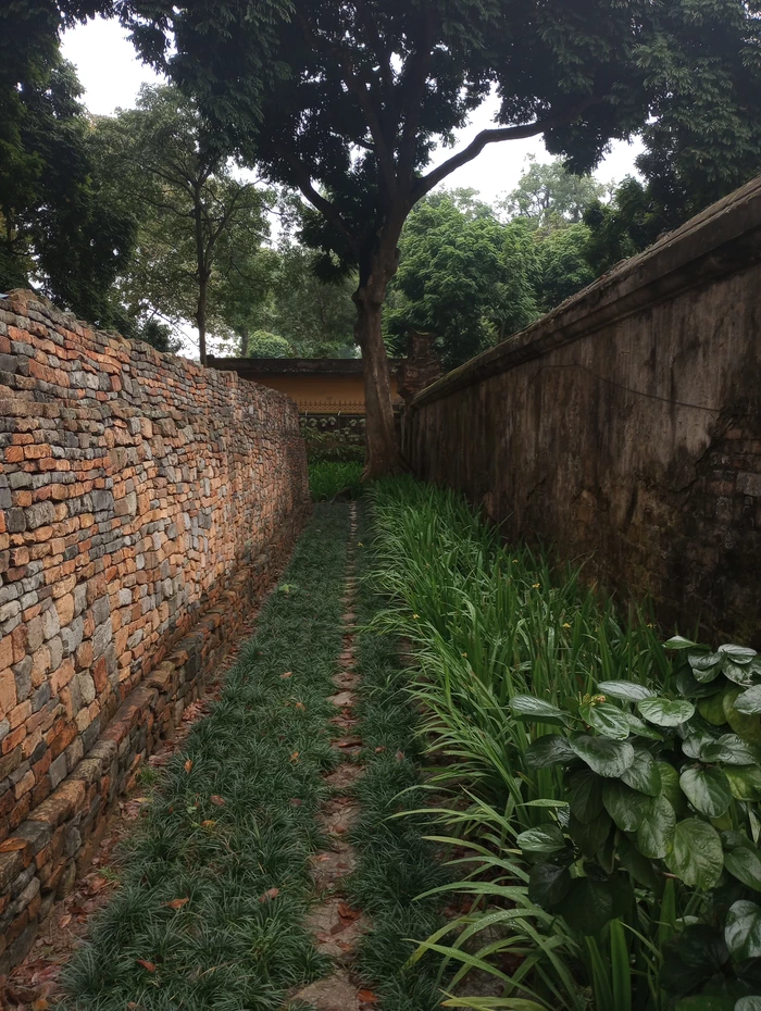 bricks piled by wall